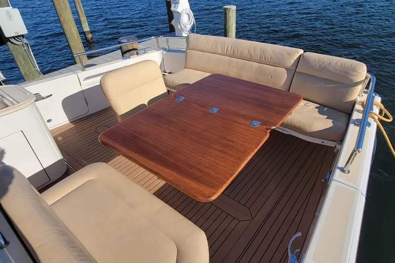 Captivator Yacht Photos Pics 2017 MJM 40z Downeast yacht with elegant teak deck and comfortable seating.