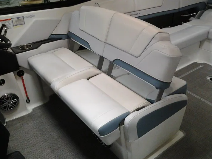  Yacht Photos Pics 2018 Formula 310 Sun Sport boat interior with white and blue seating.