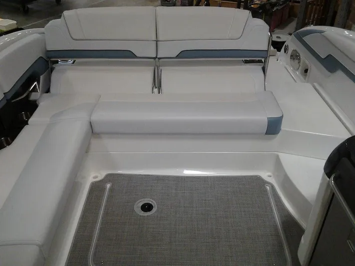  Yacht Photos Pics 2018 Formula 310 Sun Sport boat interior with white seating and gray flooring.
