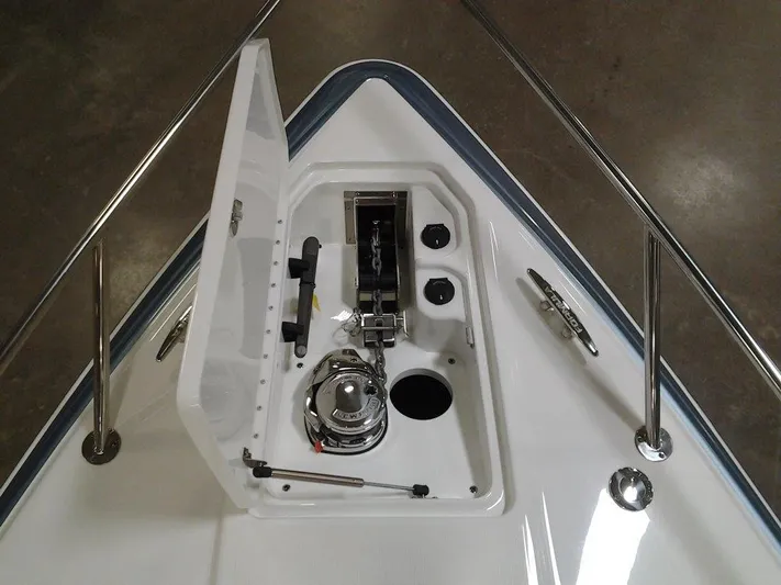  Yacht Photos Pics 2018 Formula 310 Sun Sport boat anchor compartment with open hatch and stainless steel fittings.