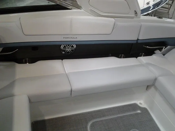  Yacht Photos Pics 2018 Formula 310 Sun Sport boat interior with white seating and sleek design.