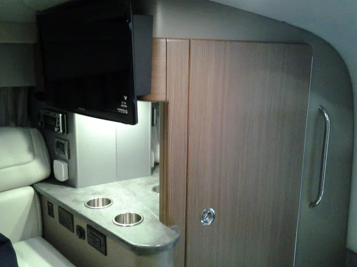  Yacht Photos Pics Interior of 2018 Formula 310 Sun Sport with TV and modern cabinetry.
