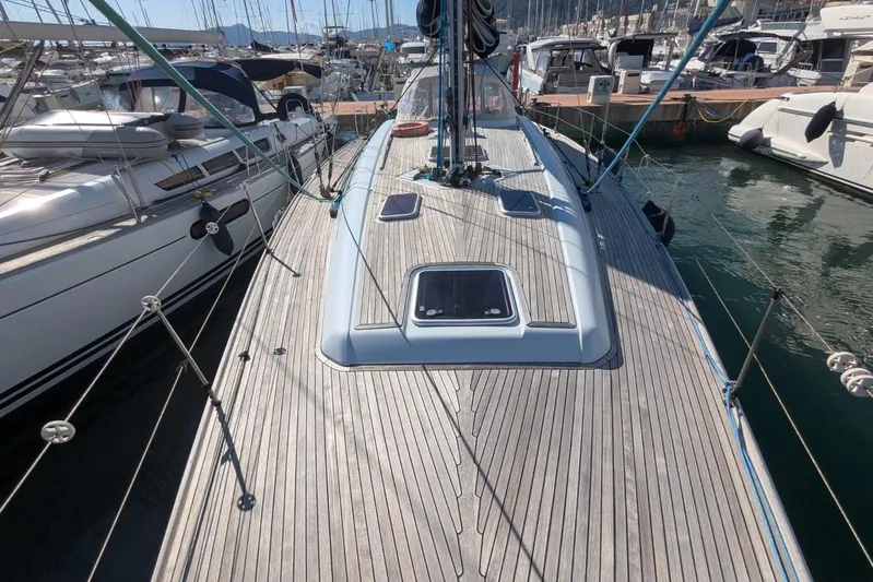  Yacht Photos Pics 2006 Grand Soleil 50 sailboat docked in a marina, showcasing sleek deck design.