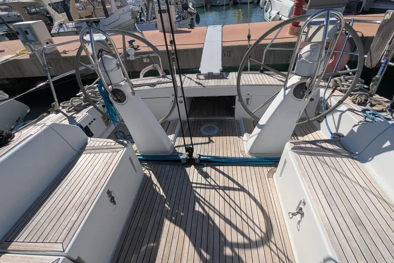  Yacht Photos Pics 2006 Grand Soleil 50 yacht cockpit with dual steering wheels and teak decking.
