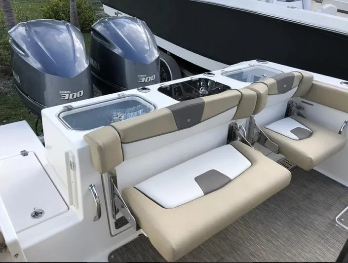  Yacht Photos Pics 2018 Wellcraft 302 Fisherman boat with dual Yamaha 300 engines and comfortable seating.