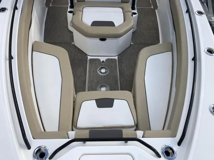  Yacht Photos Pics 2018 Wellcraft 302 Fisherman boat interior with cushioned seating and sleek design.