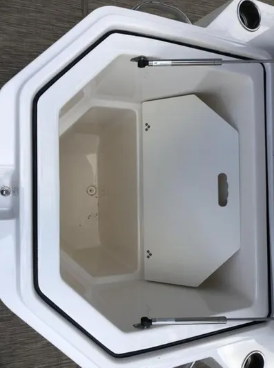  Yacht Photos Pics Open storage compartment on 2018 Wellcraft 302 Fisherman boat.