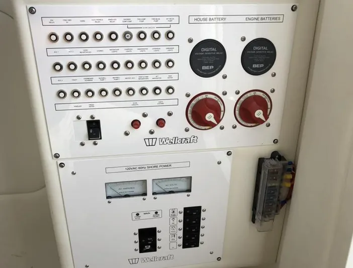  Yacht Photos Pics Control panel of 2018 Wellcraft 302 Fisherman boat with battery and power switches.
