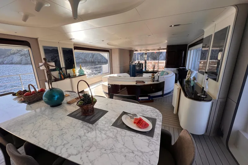 Dagusha Yacht Photos Pics Luxurious interior of 2020 Azimut Grande 35 Metri yacht with elegant dining area.