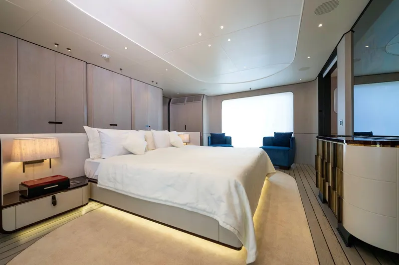 Dagusha Yacht Photos Pics Luxurious bedroom interior of 2020 Azimut Grande 35 Metri yacht, featuring elegant design.