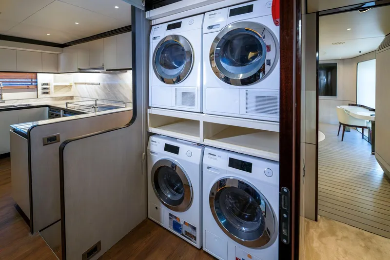 Dagusha Yacht Photos Pics Laundry area with modern appliances on Azimut Grande 35 Metri yacht, 2020 model.
