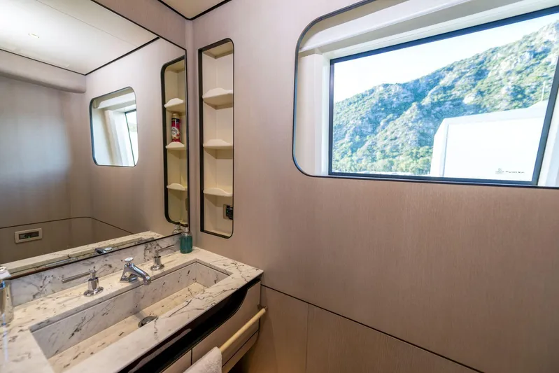 Dagusha Yacht Photos Pics Luxurious bathroom interior of 2020 Azimut Grande 35 Metri yacht with scenic window view.