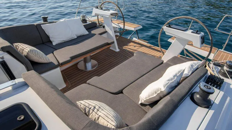  Yacht Photos Pics Luxurious seating area on 2025 Hanse 410 yacht with ocean view.
