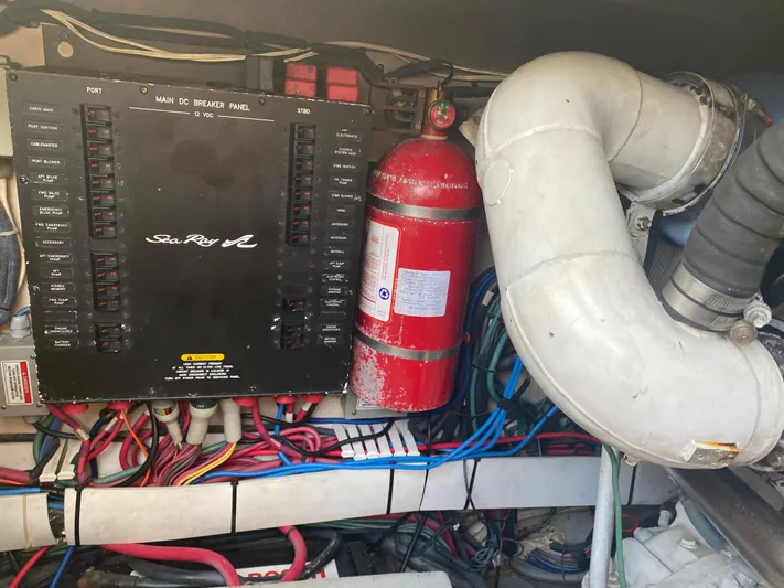  Yacht Photos Pics Engine room of 2006 Sea Ray 48 Sundancer with electrical panel and fire extinguisher.