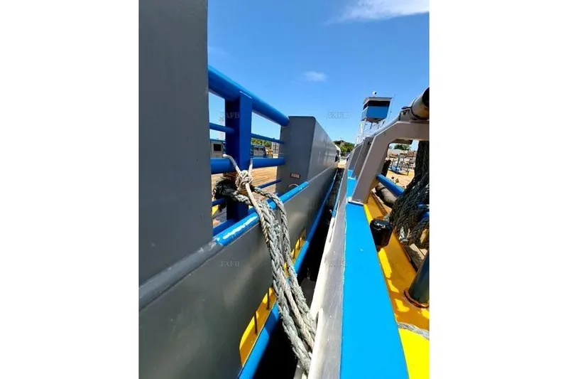  Yacht Photos Pics Colorful boat deck with ropes and railings under a clear blue sky, custom model 2008.