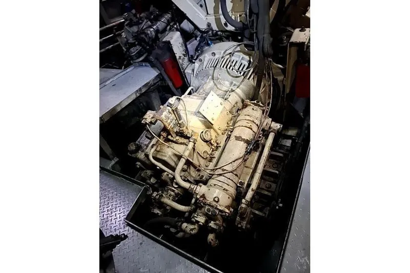  Yacht Photos Pics Custom 2008 engine with complex piping and mechanical components in an industrial setting.