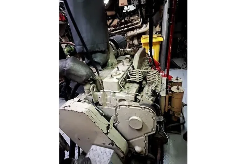  Yacht Photos Pics Custom 2008 engine in a workshop setting, showcasing mechanical components.