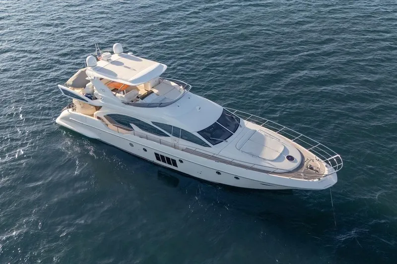 Drakkar Yacht Photos Pics Luxury 2012 Azimut Evolution yacht cruising on open water.
