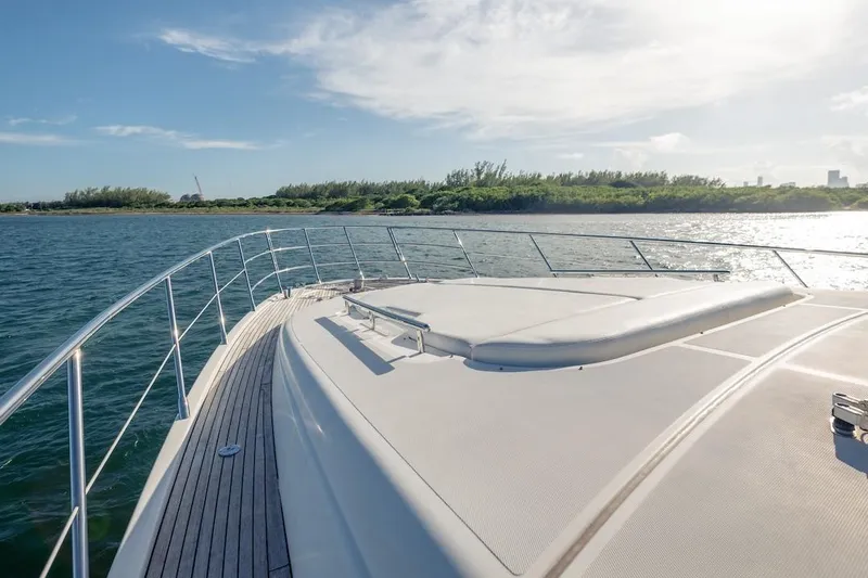 Drakkar Yacht Photos Pics Luxurious 2012 Azimut Evolution yacht deck with scenic water view.