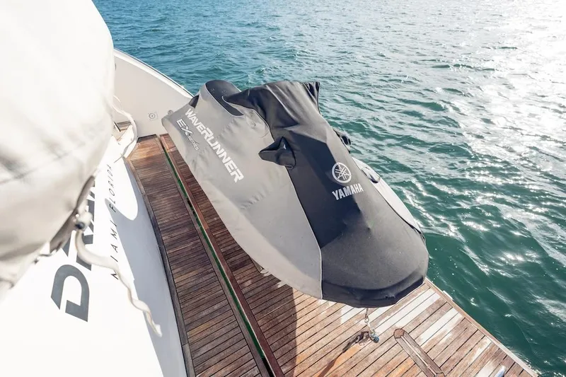 Drakkar Yacht Photos Pics 2012 Azimut Evolution yacht with Yamaha WaveRunner on deck, overlooking the ocean.