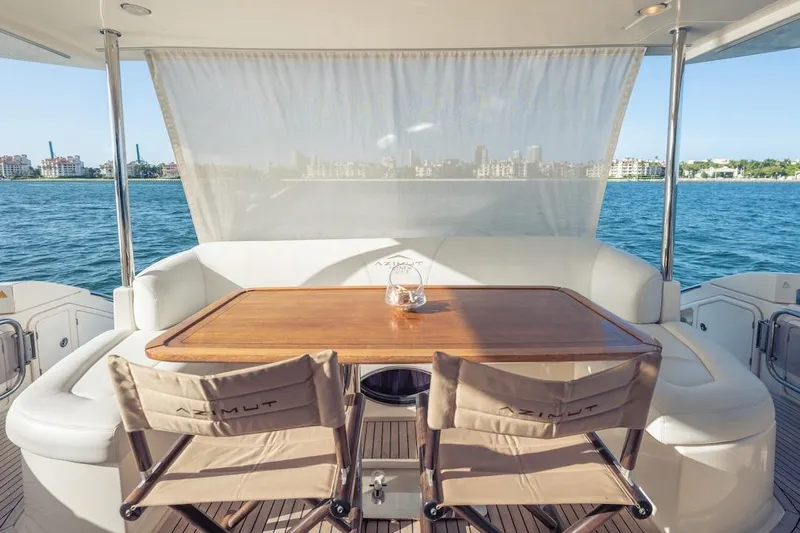 Drakkar Yacht Photos Pics Luxury Azimut Evolution 2012 yacht deck with elegant seating and ocean view.