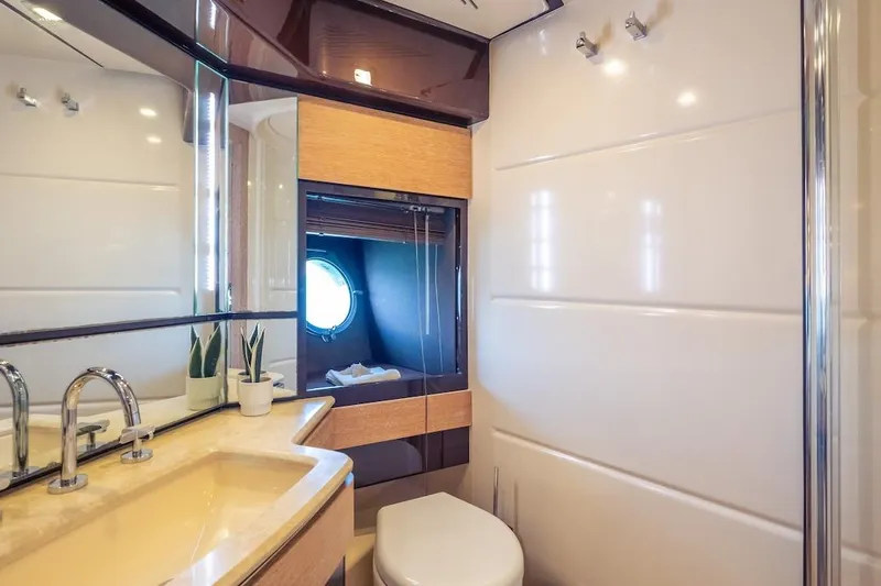 Drakkar Yacht Photos Pics Luxurious 2012 Azimut Evolution yacht bathroom with modern fixtures and elegant design.