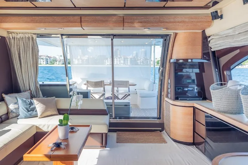 Drakkar Yacht Photos Pics Luxurious interior of 2012 Azimut Evolution yacht with elegant seating and scenic ocean view.