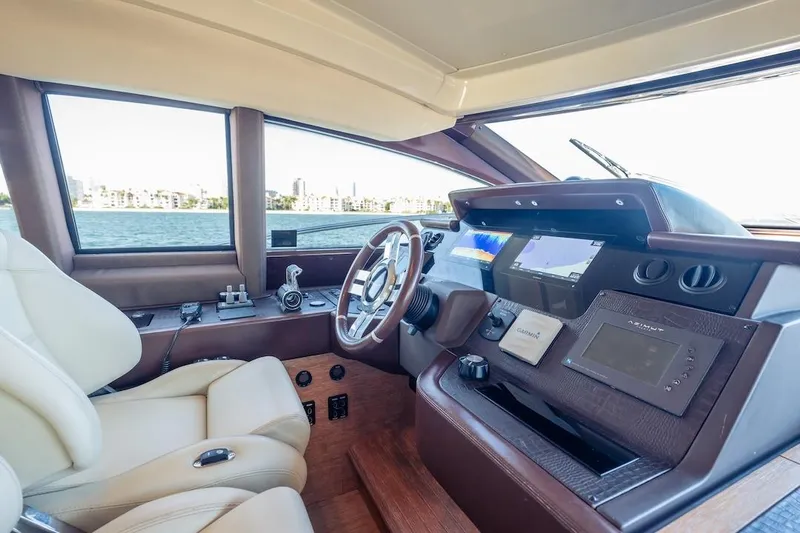 Drakkar Yacht Photos Pics Luxurious 2012 Azimut Evolution yacht cockpit with modern navigation systems and leather seating.