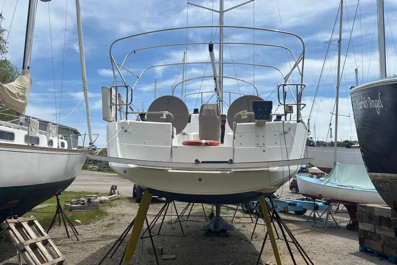 Statira Yacht Photos Pics 2017 Jeanneau Sun Odyssey 389 sailboat on stands in a boatyard.