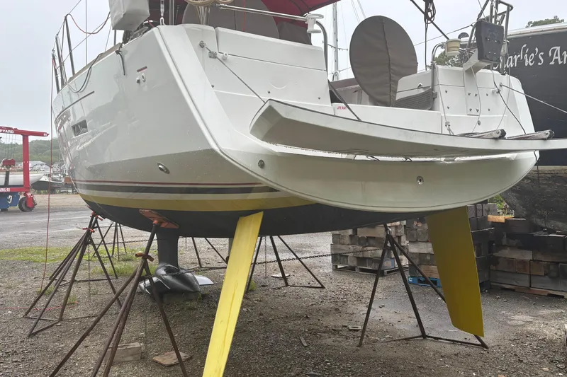 Statira Yacht Photos Pics 2017 Jeanneau Sun Odyssey 389 sailboat on stands in a boatyard.