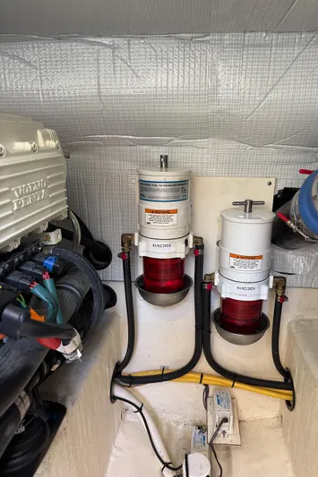  Yacht Photos Pics Engine room of 2019 Sabre 42 Salon Express with fuel filters and wiring.