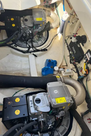  Yacht Photos Pics Engine room of 2019 Sabre 42 Salon Express with visible machinery and components.
