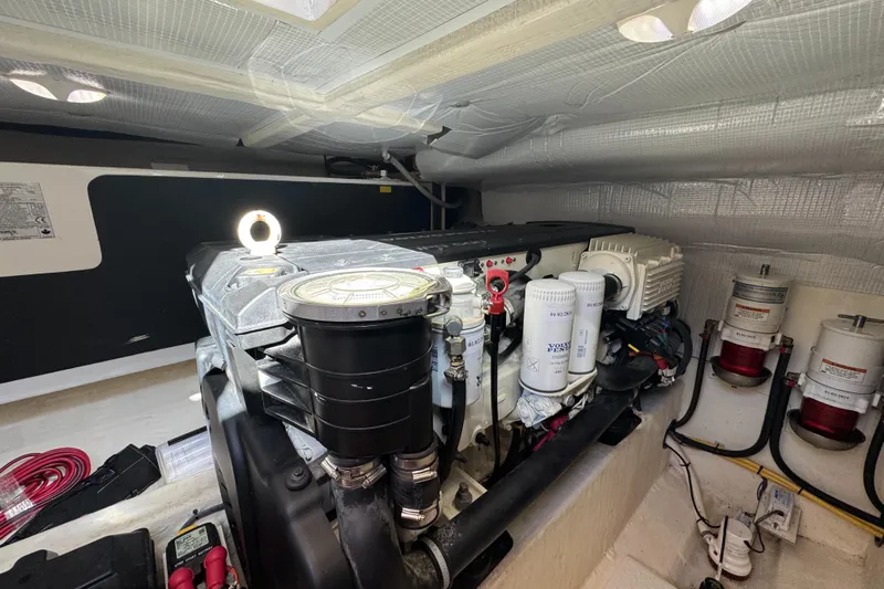  Yacht Photos Pics Engine room of 2019 Sabre 42 Salon Express with visible components and wiring.