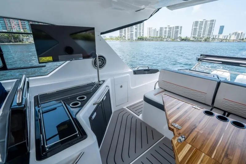  Yacht Photos Pics Luxurious 2026 Granfort 37 GTX yacht interior with modern seating and sleek design.