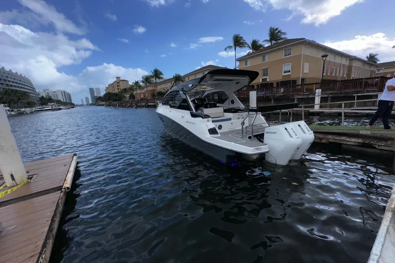  Yacht Photos Pics Granfort 37 GTX 2026 boat docked in a scenic marina with clear skies.