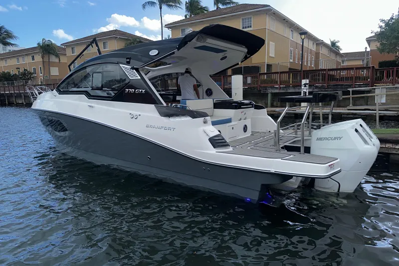  Yacht Photos Pics 2026 Granfort 37 GTX luxury boat docked in a serene marina setting.