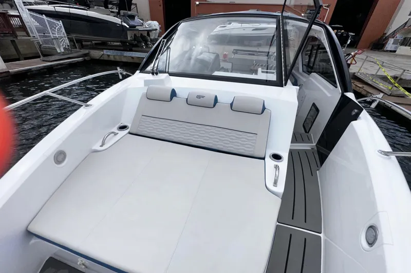  Yacht Photos Pics 2026 Granfort 37 GTX boat with sleek seating and modern design at a dock.
