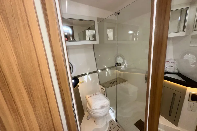  Yacht Photos Pics Luxurious bathroom in 2026 Granfort 37 GTX yacht with modern fixtures and wooden accents.