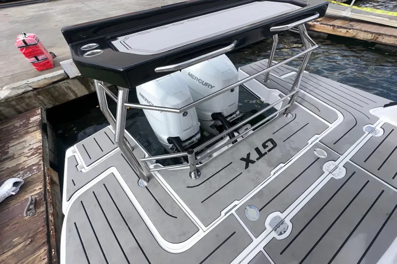  Yacht Photos Pics Granfort 37 GTX 2026 boat with dual Mercury engines at a dock.