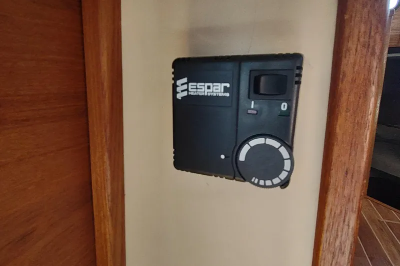 Dobro Yacht Photos Pics Espar heater control panel on 1990 Nordic Tug 32 boat interior.