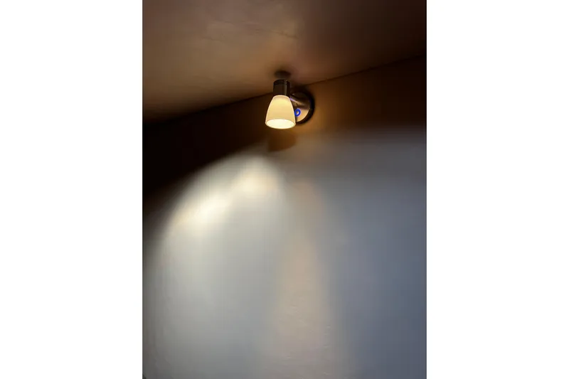 Dobro Yacht Photos Pics Wall-mounted light fixture on a Nordic Tug 32, 1990 model.