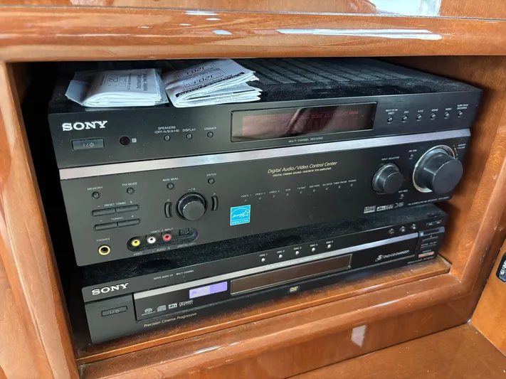 Bad Bettye Yacht Photos Pics Sony audio equipment in a 2006 Marquis 65 yacht's wooden cabinet.