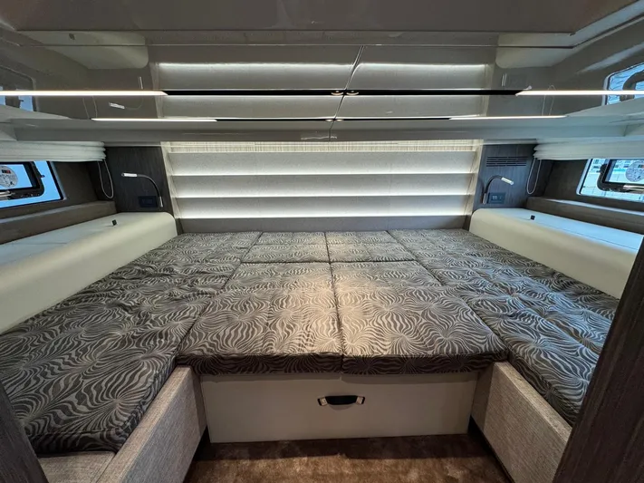  Yacht Photos Pics Luxurious interior of 2024 Cranchi A46 Luxury Tender with spacious bed and modern design.