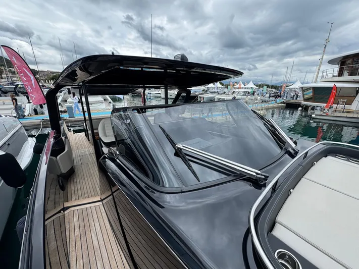  Yacht Photos Pics 2024 Cranchi A46 Luxury Tender docked at marina, showcasing sleek design and modern features.