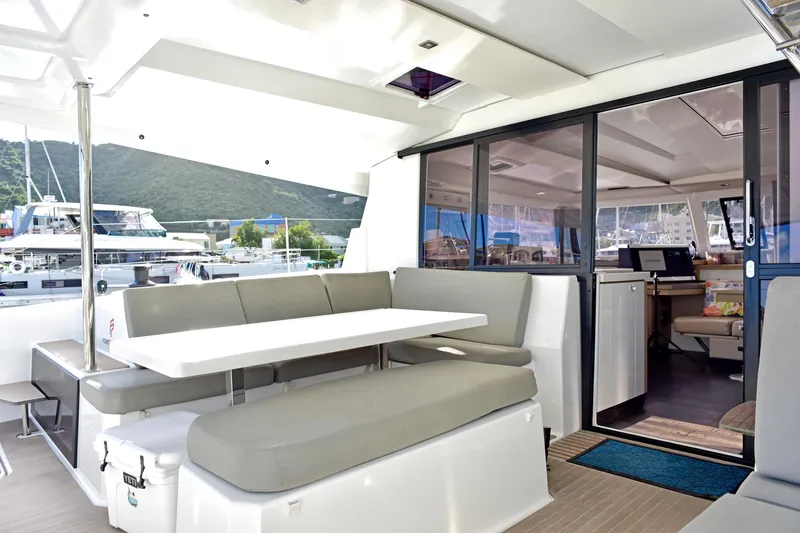 Boomerang Yacht Photos Pics 2022 Fountaine Pajot Astrea 42 yacht interior with spacious seating and modern design.