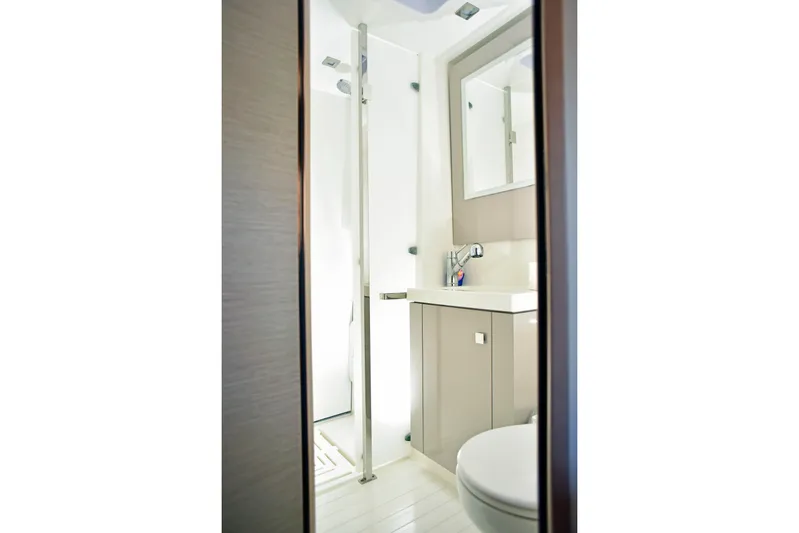 Boomerang Yacht Photos Pics Modern bathroom interior on 2022 Fountaine Pajot Astrea 42 catamaran.