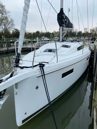 Job Site Yacht Photos Pics 2023 Jeanneau Sun Odyssey 380 sailboat docked in a marina.