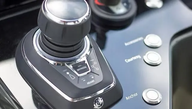  Yacht Photos Pics Control panel of 2025 Schaefer V33 yacht with joystick and buttons.