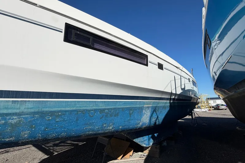 Gratitude Yacht Photos Pics 2015 Leopard 48 yacht on dry dock, showing hull and side view.