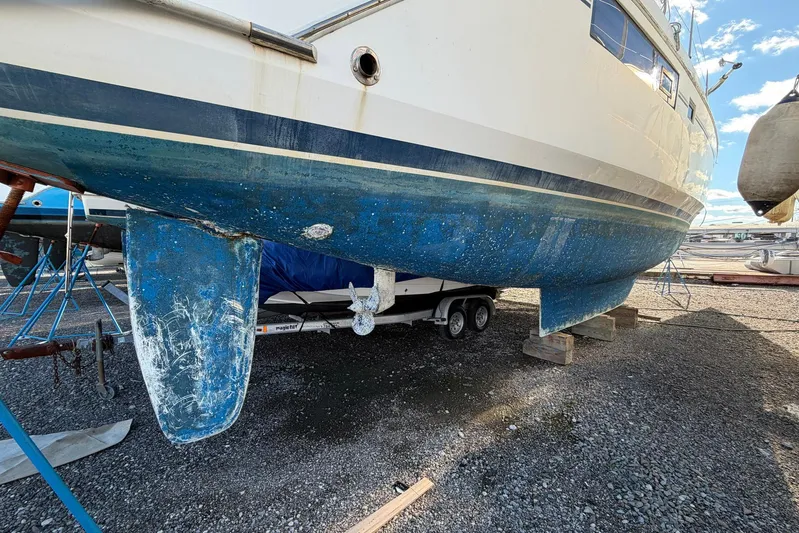 Gratitude Yacht Photos Pics 2015 Leopard 48 catamaran on dry dock, showing hull and keel details.